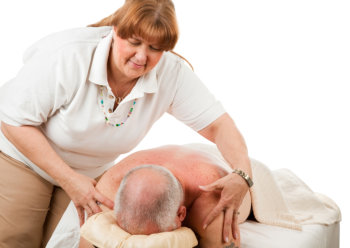 therapist massaging the old man